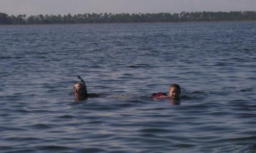 Captain Mark and PaytonScalloping